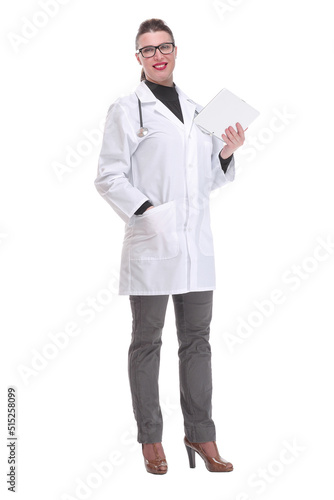 Full lenth portrait of a happy young doctor working with a tablet