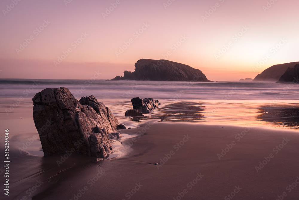 The spectacular rock formations on the shore of La Arnía beach at low tide at sunrise, Costa Quebrada, Liencres, Cantabria, Spain