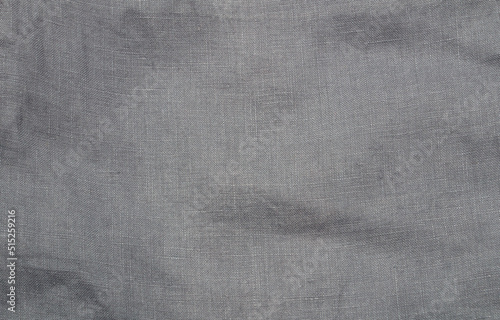 Gray blue fabric background with waves.