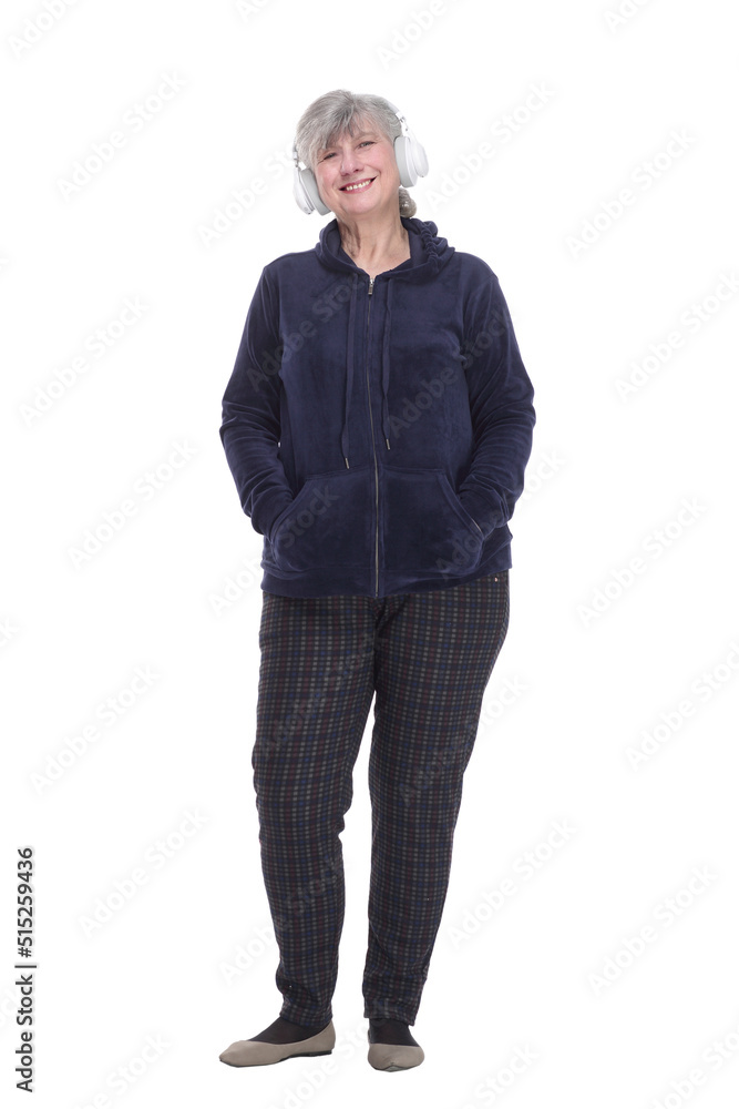 contented old woman with headphones . in full growth. contented old woman with headphones . in full growth.