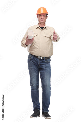 Construction worker holding blueprints and giving thumbs-up