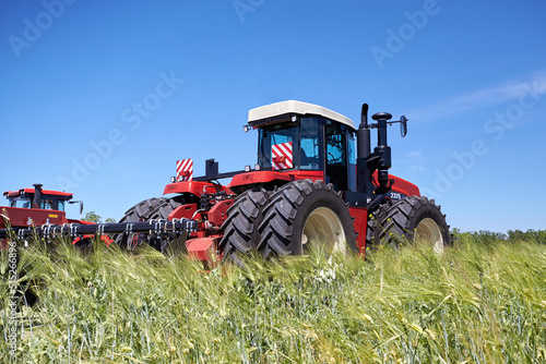 Two large modern wheeled tractors