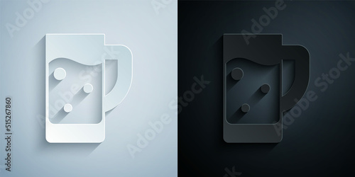 Paper cut Glass of beer icon isolated on grey and black background. Paper art style. Vector