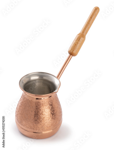 copper cezve for coffee isolated on a white background