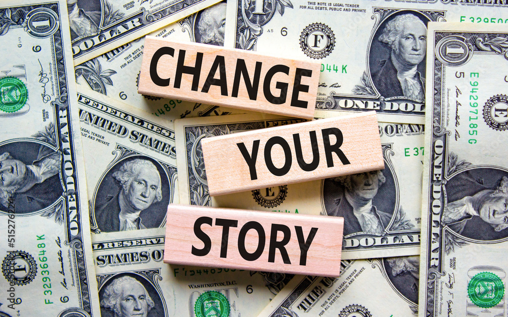 Change your story symbol. Concept words Change your story on wooden blocks on a beautiful background from dollar bills. Business finacial and change your story concept. Copy space.