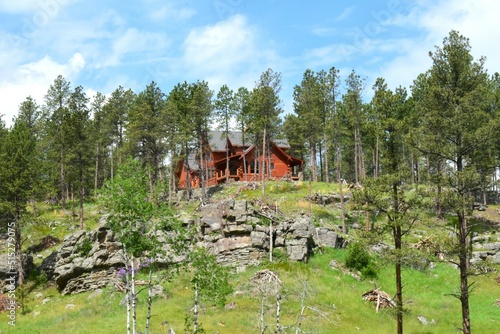 A red cabin in the woods of South Dakota