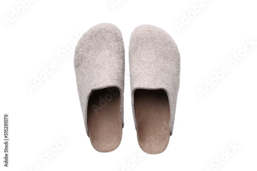 Pair of soft home felt or wool slippers isolated on white background top view photo