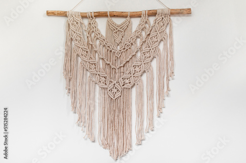 threads in  style of macrame on a white background