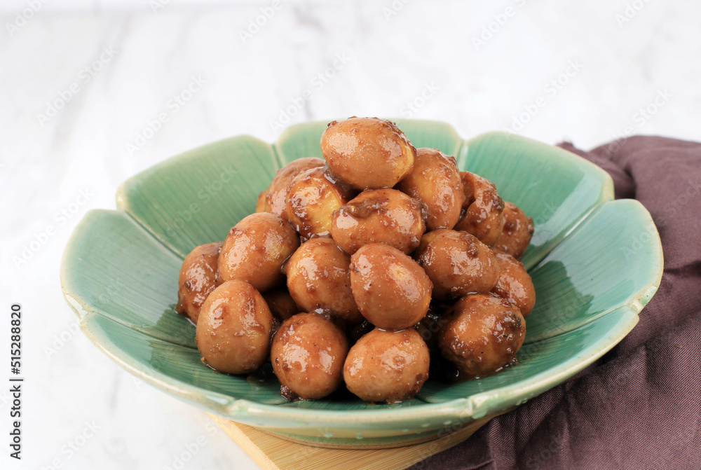 Homemade Delicious Stewed Braised Small Quail Eggs in a Plate for Eating Homemade Delicious Stewed Braised Small Quail Eggs in a Plate for Eating