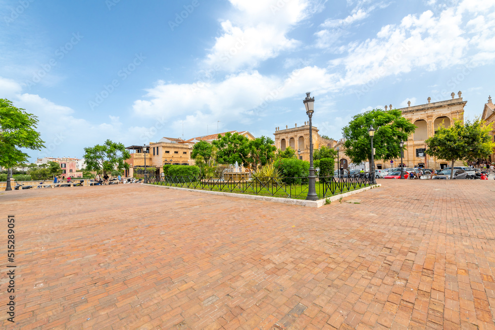 The Placa des Born, the main park and town square in the center of the port town of Ciutadella, on the Balearic island of Menorca, Spain.