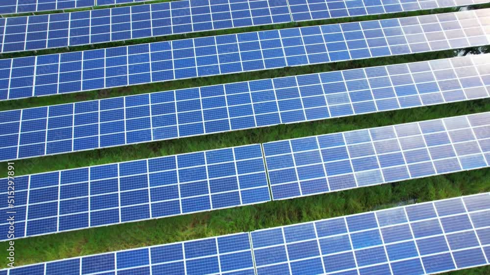 Aerial view of solar power plant, renewable energy good for the environment. Clean energy production Samut Songkhram, Thailand. drone footage. 4k
Aerial view of solar power plant, renewable energy good for the environment. Clean energy production Samut Songkhram, Thailand. drone footage. 4k