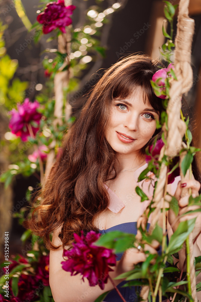 fabulous. a beautiful and gentle woman in peony flowers. feminine beauty. fabulous. a beautiful and gentle woman in peony flowers. feminine beauty.