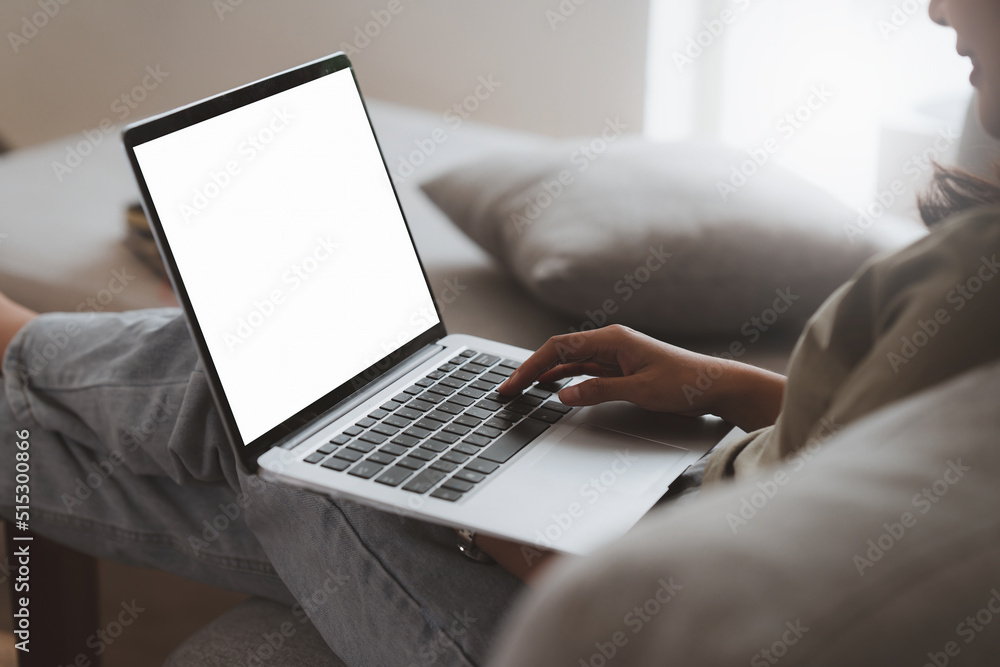 Portrait of Happy Beautiful woman lay down on cozy couch and listen music by streaming on laptop. Portrait of Happy Beautiful woman lay down on cozy couch and listen music by streaming on laptop.