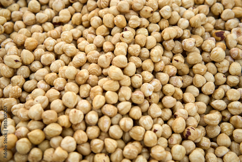 Hazelnut Background. Heap of peeled hazelnuts. Macro texture. High quality photo Hazelnut Background. Heap of peeled hazelnuts. Macro texture. High quality photo