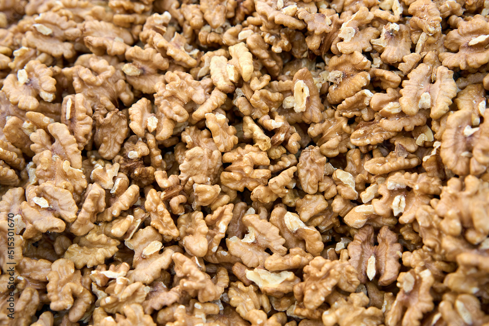 Closeup of big shelled walnuts pile. High quality photo Closeup of big shelled walnuts pile. High quality photo