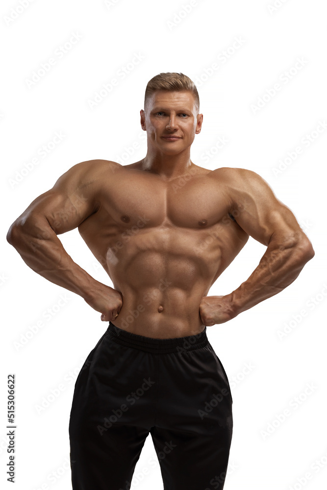 High level professional bodybuilder showing lats in front High level professional bodybuilder showing lats in front