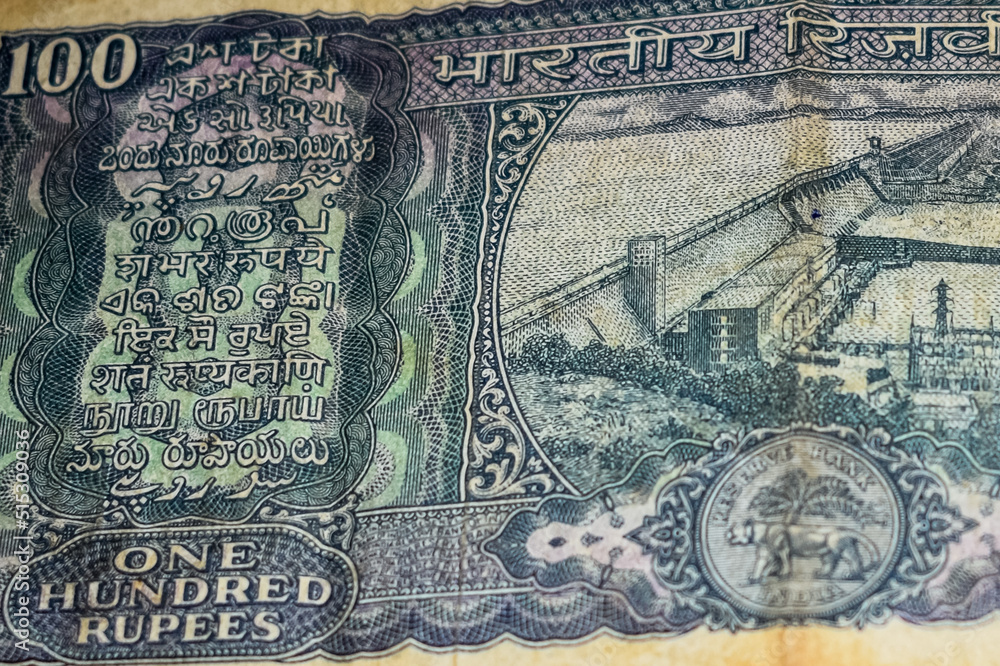 Rare Old One Hundred Rupee notes combined on the table, India money on the rotating table. Old Indian Currency notes on a rotating table, Indian Currency on the table
