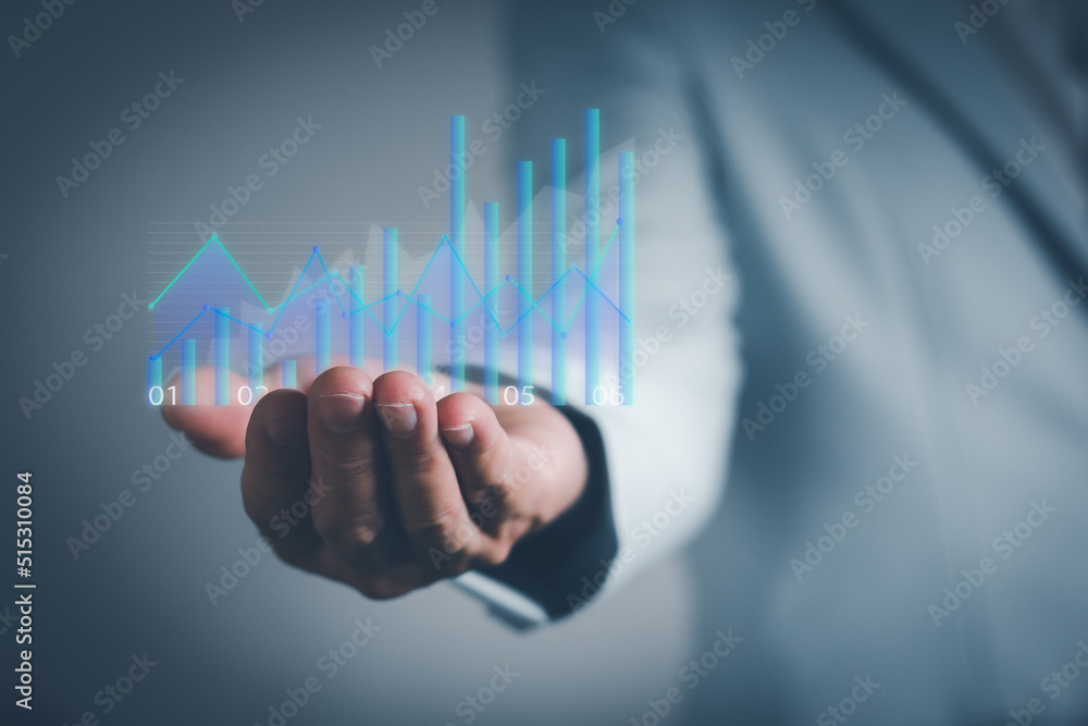 Business growth graph in man hand. Business growth graph in man hand.