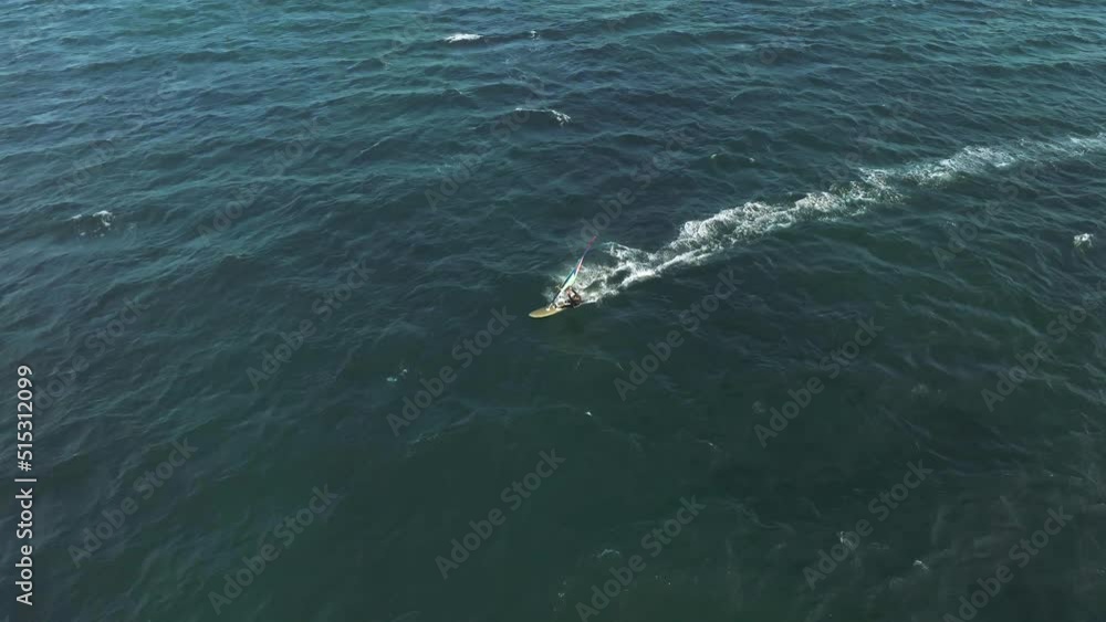 4k slow motion drone shot of windsurfer in Guincho, Portugal. 4k slow motion drone shot of windsurfer in Guincho, Portugal.