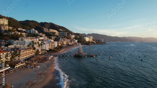 Wallpaper Mural Puerto Vallarta riviera at sunset with oceanfront hotels and resorts on the mountain, aerial Torontodigital.ca