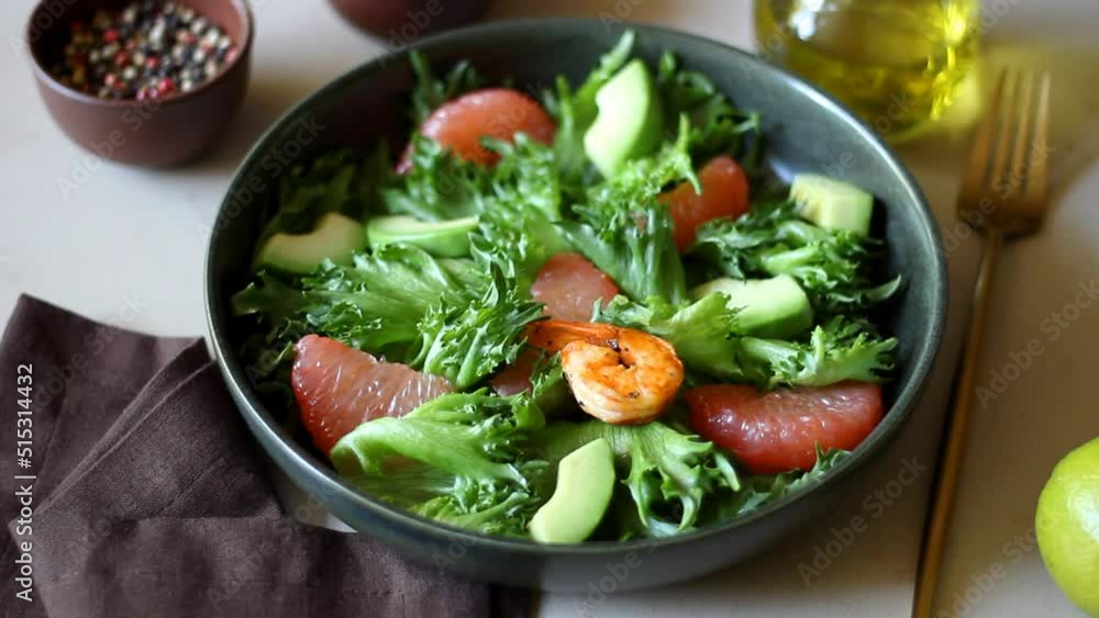Salad with shrimp, grapefruit, avocado and nuts. Healthy eating. Diet. Salad with shrimp, grapefruit, avocado and nuts. Healthy eating. Diet.