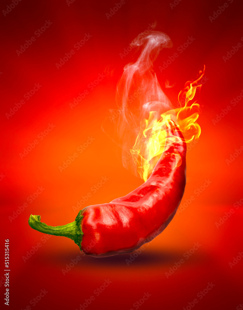 Chilli peppers with fire, spicy chili. Fresh red chilli pepper in fire