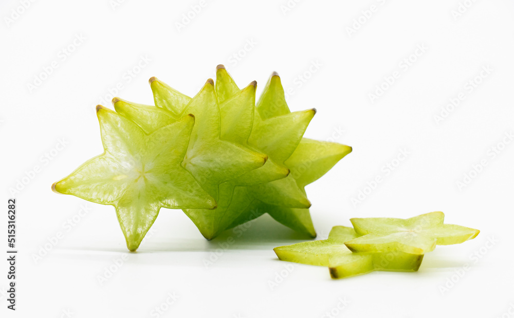 Naklejka premium Star fruit or carambola slices on white background.