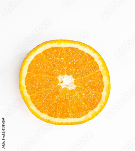 single orange fruit slices over on white background.top view