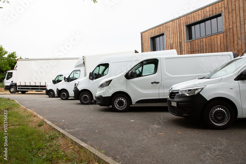 van transportation truck park white Delivery Trucks in Warehouse distribution logistic Building