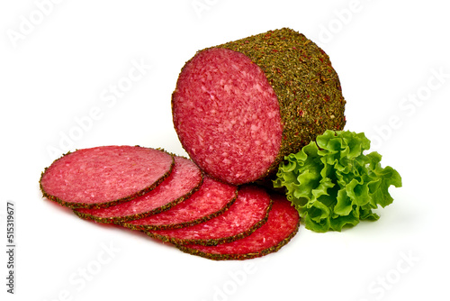 Obraz na plátne Dried organic salami sausage covered with pepper, isolated on white background
