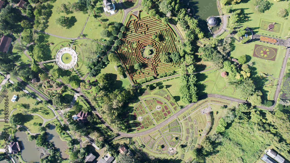 Fototapeta premium Aerial view of The Taman Bunga Nusantara or Flower Garden Nusantara, a travel destination located in Cianjur. Cianjur, Indonesia, July 6, 2022