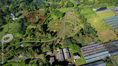 Aerial view of The Taman Bunga Nusantara or Flower Garden Nusantara, a travel destination located in Cianjur. Cianjur, Indonesia, July 6, 2022 photo