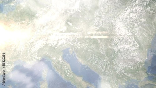 Earth zoom in from outer space to city. Zooming on Celje, Slovenia. The animation continues by zoom out through clouds and atmosphere into space. Images from NASA