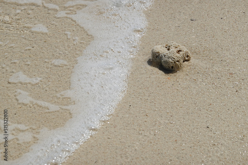 Strolling on the beach on a sunny day, Crystal sea Foam rippling the beach softly