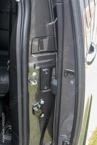Sliding door hinge on a modern MPV