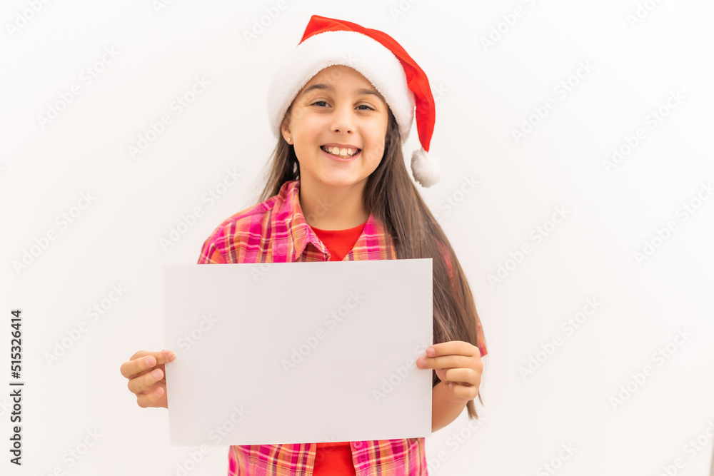 Christmas girl standing with empty horizontal blank in hands, above view, isolated on white Christmas girl standing with empty horizontal blank in hands, above view, isolated on white