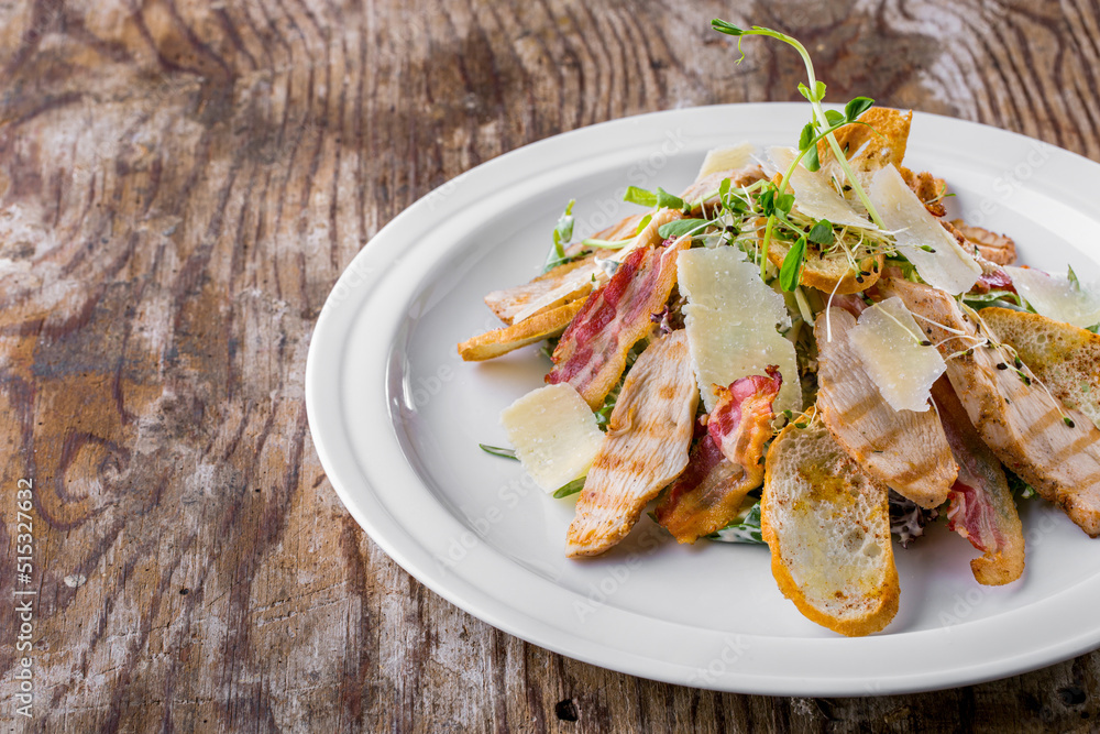 Caesar salad with ham, cheese, bacon Caesar salad with ham, cheese, bacon