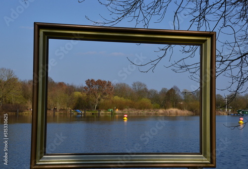 Fototapeta Naklejka Na Ścianę i Meble -  Framed Panorama in Spring at the River Weser in Dörverden, Lower Saxony