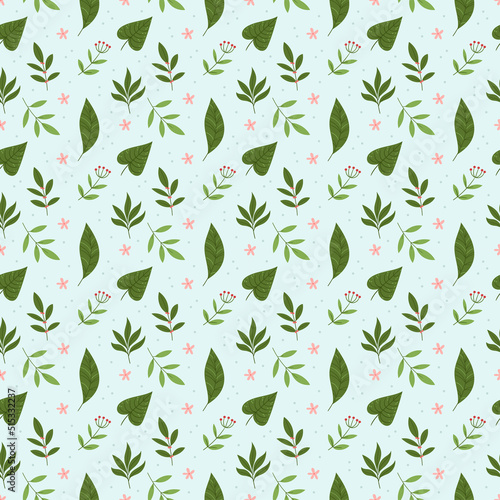 Cute seamless pattern with leaves of rainforest plants on a mint background.Background with jungle foliage. Natural summer illustration for textile print, wrapping paper, clothing print.