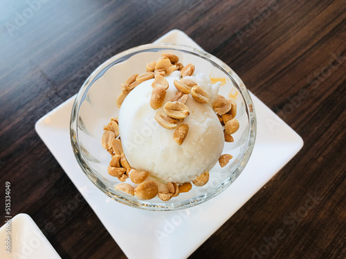 Coconut ice cream topped with roasted peanut in Thailand.