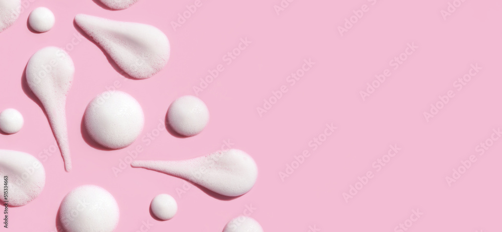 texture foam mousse foam cosmetic smear sample on pink background - obrazy, fototapety, plakaty 