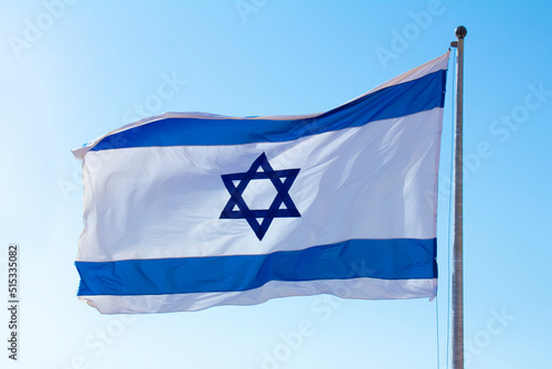 image of the flag of Israel On a bright sky background