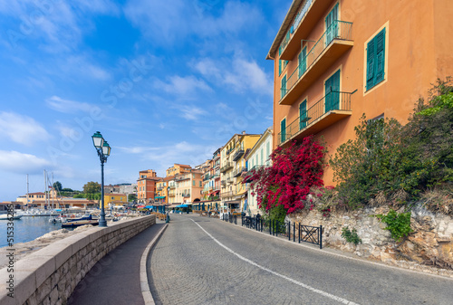 France, French Riviera, Villefranche old city streets in historic city center near sea promenade.
