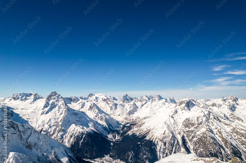 snowy mountains and clear skies 