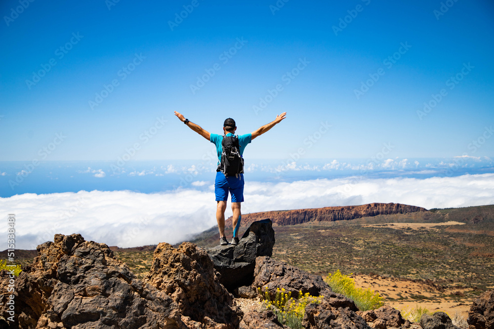 man hiking in El Teide national park Tenerife man hiking in El Teide national park Tenerife