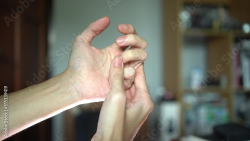A man doing a knuckle cracking