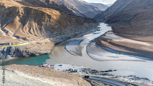 The confluence of Zanskar and Indus rivers near the scenic Nimmu valley of Leh Ladakh India