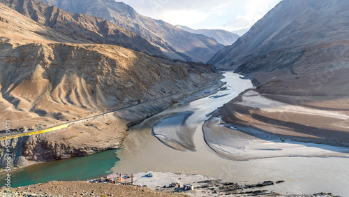 The confluence of Zanskar river and Indus river near the scenic Nimmu valley of Ladakh