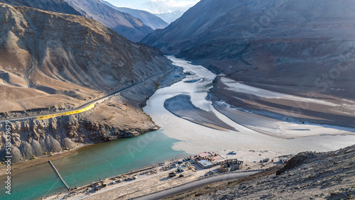The confluence of Zanskar river and Indus river near the scenic Nimmu valley of Ladakh photo