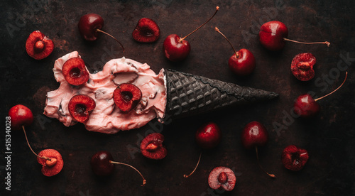 Cherry ice cream on the dark rustic background. Selective focus.